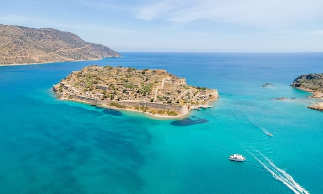 Mirabello Bay view by drone with Spinalonga island on Crete, Greece @ credit Depositphotos
