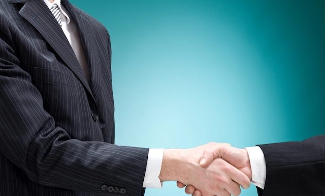 business man positive deal with handshake isolated