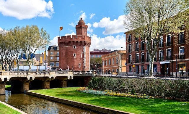 View to the Canal and Castle of Perpignan in springtime. Pyrenees-Orientales, France