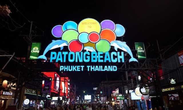 PHUKET, THAILAND - APRIL 15, 2023: Patong Beach Bangla Walking Street sign as seen in the night.