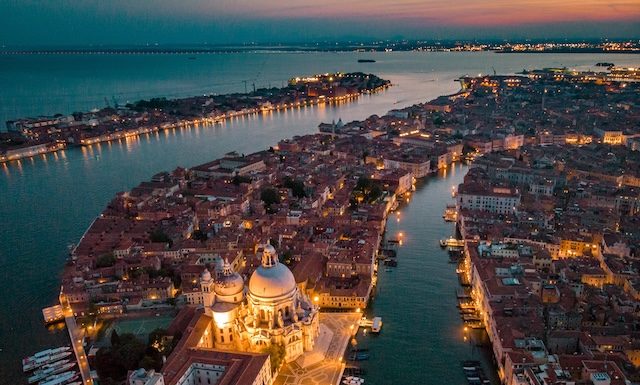 Venice from above with drone, Aerial drone photo of iconic and unique Saint Mark's square or Piazza San Marco featuring Doge's Palace, Basilica and Campanile, Venice, Italy. Europe