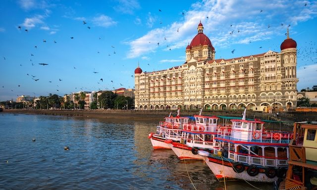 Tourist boats in front of the famous Taj Hotel in the morning