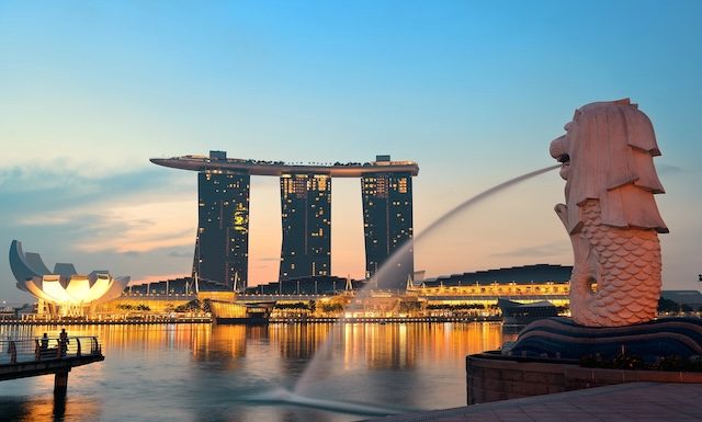 Singapore skyline with urban buildings over water