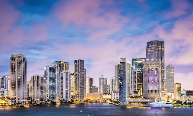 Skyline of Miami, Florida, USA at Brickell Key and Miami River.