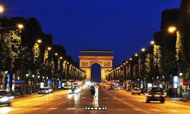 The Champs-Elysees at night in Paris, France