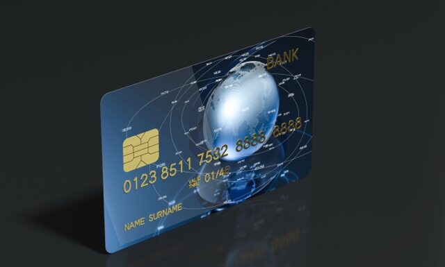 Blue bank card with dark background, 3d rendering. Computer digital drawing.