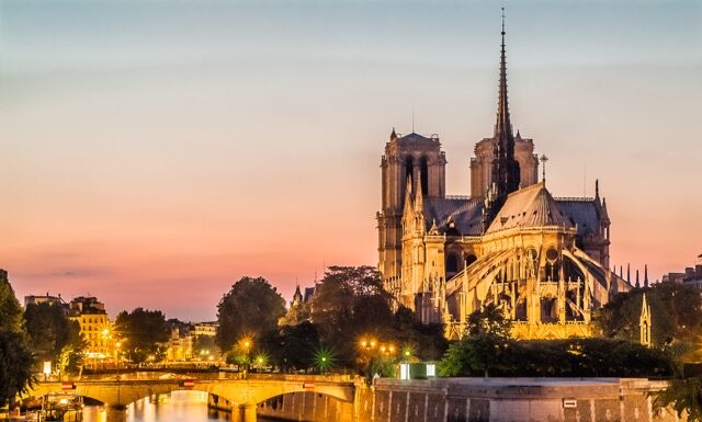 Notre-Dame de Paris by night and the seine river France in the city of Paris in france