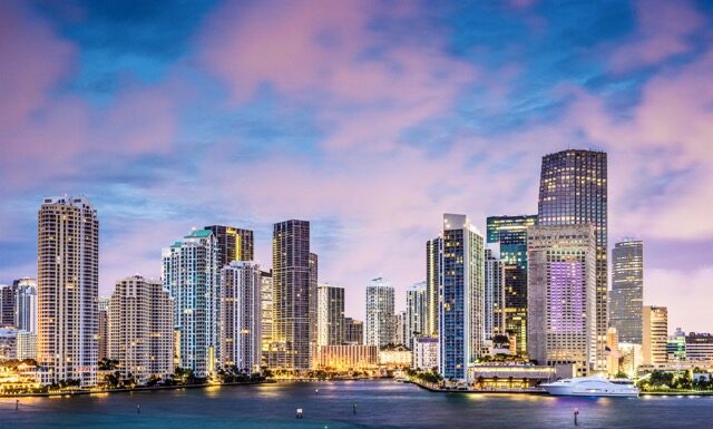 Skyline of Miami, Florida, USA at Brickell Key and Miami River.