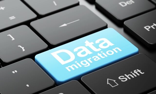Information concept: computer keyboard with word Data Migration, selected focus on enter button background, 3d render