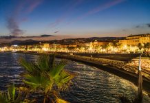 Riviera | L’Hôtel Palais de la Méditerranée rejoint The Unbound Collection by Hyatt NICE, FRANCE - MARCH 2, 2026: Scenic twilight view of Promenade des Anglais with city lights, palm trees, and Mediterranean coastline.