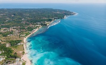 Aerial view of Bukit peninsula with blue ocean in Bali