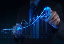 France | Groupe Premium franchit les 500 M€ et renforce son ancrage dans l’hôtellerie économique businessman hand working with new modern computer and business strategy as concept @ credit Depositphotos