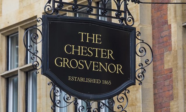 Chester, UK - August 1st 2018: A sign above the entrance to the Chester Grosvenor Hotel in the historic city of Chester, UK. The hotel is owned by the Duke of Westminster.