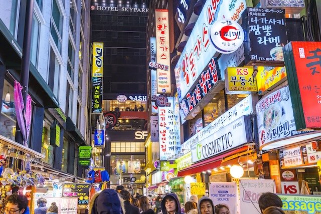 Illustration Myeong-Dong district at night. The location is the premiere district for shopping in the city @ credit Depositphotos.com Illustration Myeong-Dong district at night. The location is the premiere district for shopping in the city @ credit Depositphotos.com
