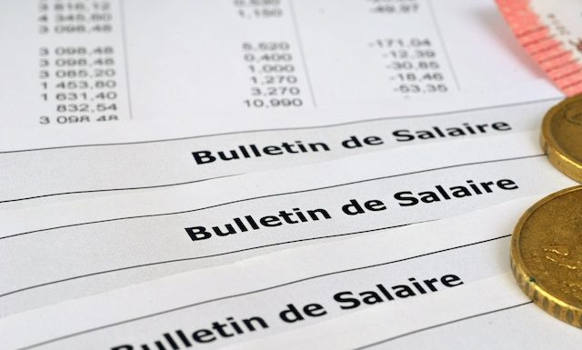 French salary slips with euros close-up