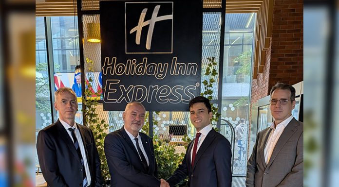 Representatives celebrate the signing of a new Holiday Inn Express project. Left to right: Csukás Endre (Director at Xanga Investment and Development Group), István Herdon (Chief Executive Officer at Xanga Investment and Development Group), Farkhad Kamilov (Development Project Manager, Northern Europe, IHG Hotels & Resors, Bruno Sousa (Director of Design, EMEAA, IHG Hotels & Resorts)